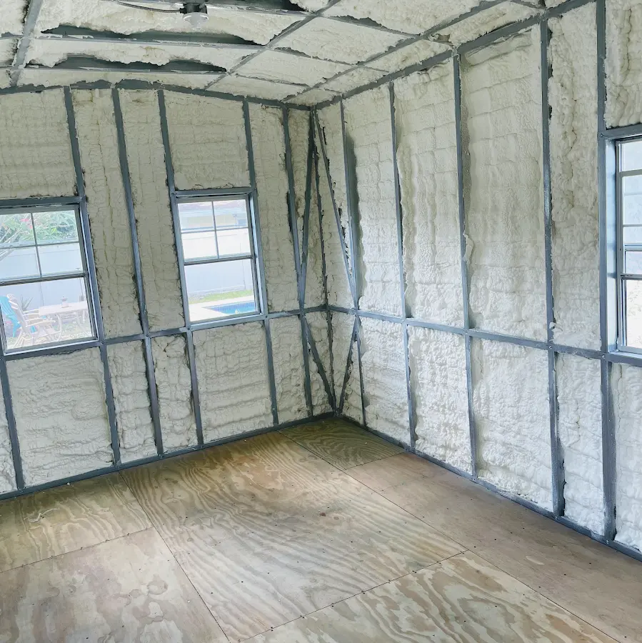 Closed-cell spray foam insulation applied to wall cavities in a residential project in Lakeside